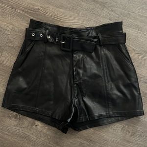Black high-waisted leather shorts with belt. Size small. LBD. Worn once!
